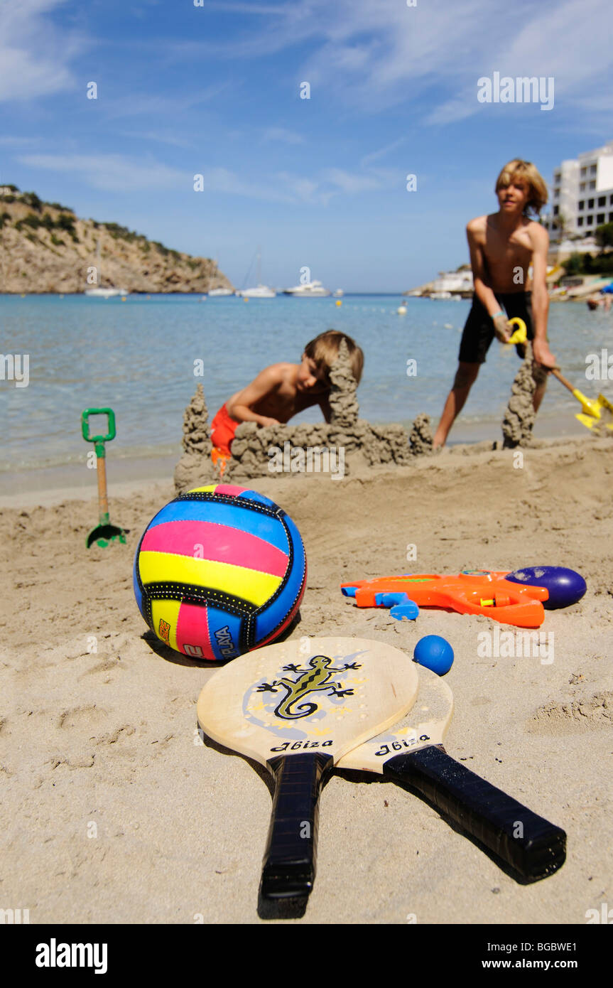 Children playing on the beach, Cala Llonga, Ibiza, Pine Islands, Balearic Islands, Spain, Europe Stock Photo