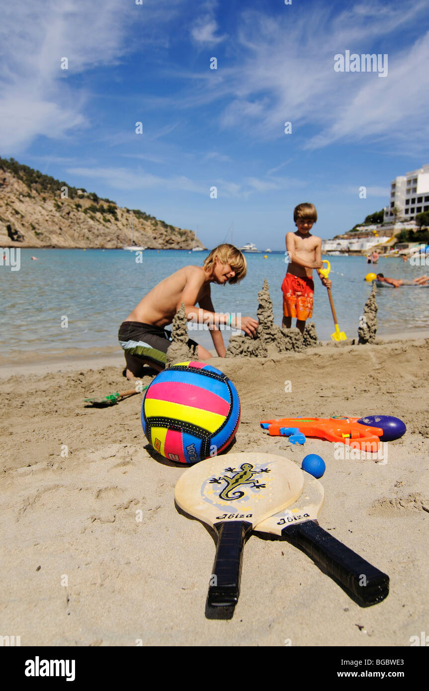 Children playing on the beach, Cala Llonga, Ibiza, Pine Islands, Balearic Islands, Spain, Europe Stock Photo
