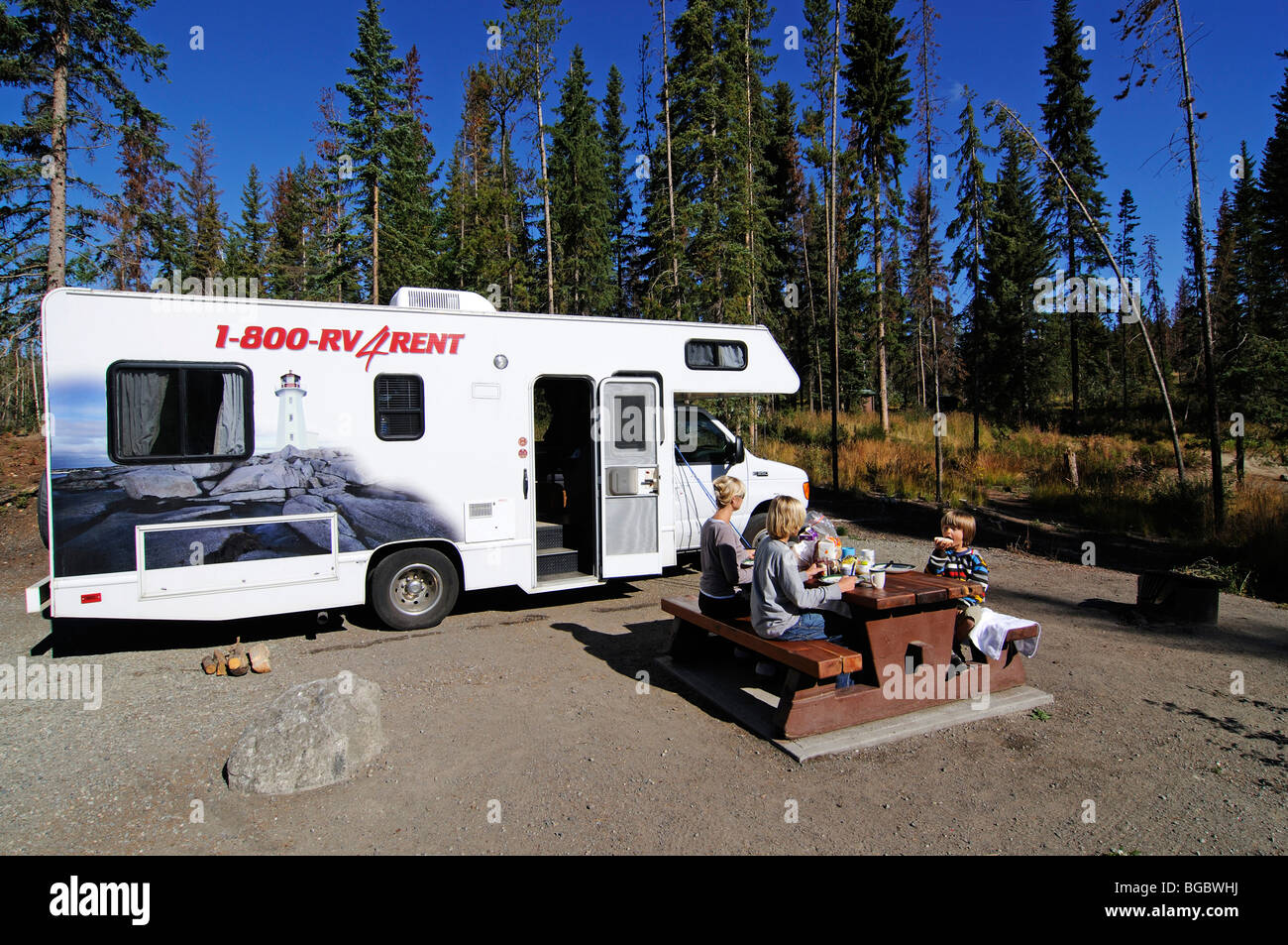 Woman and children with camper, British Columbia, Canada Stock Photo