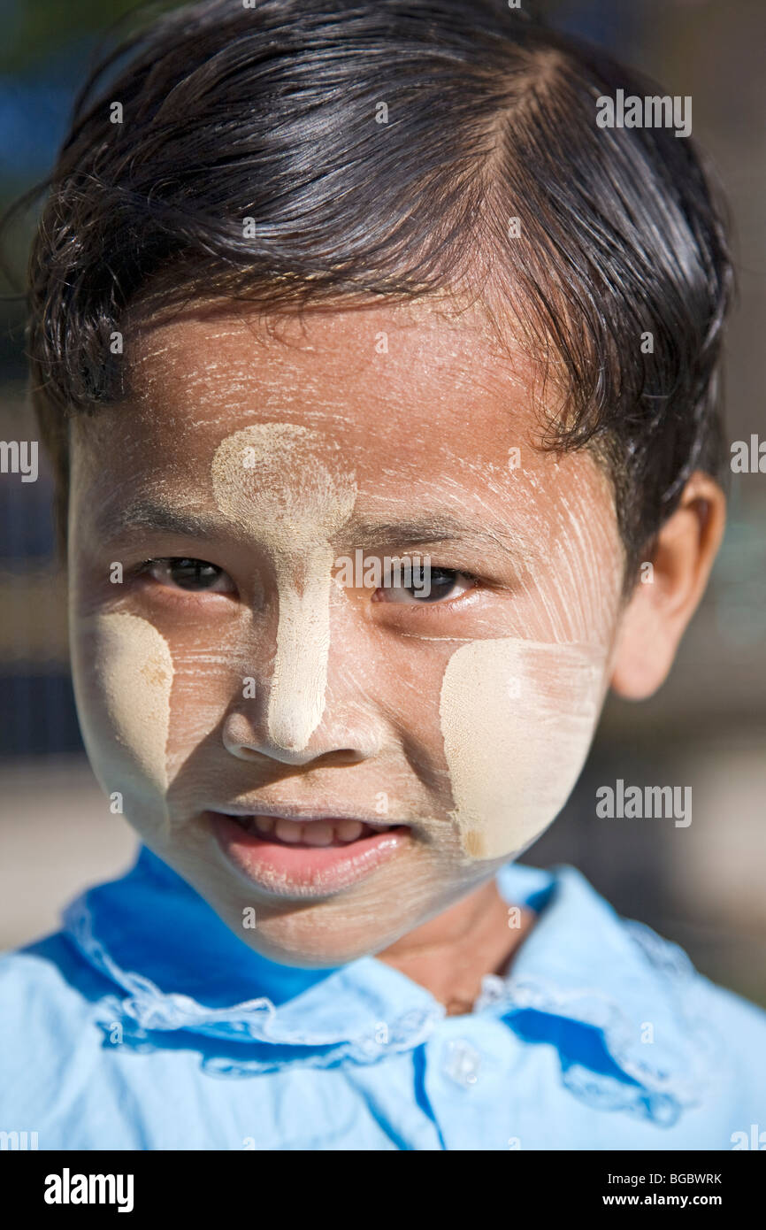 Burmese girl with traditional make-up (thanakha). Bago. Myanmar Stock Photo