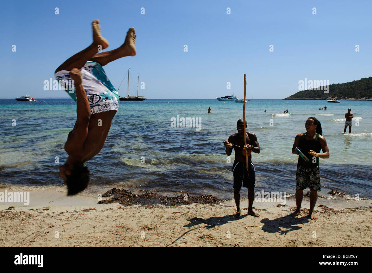 Performers, Cala de Ses Salines, Ibiza, Pine Islands, Balearic Islands, Spain, Europe Stock Photo