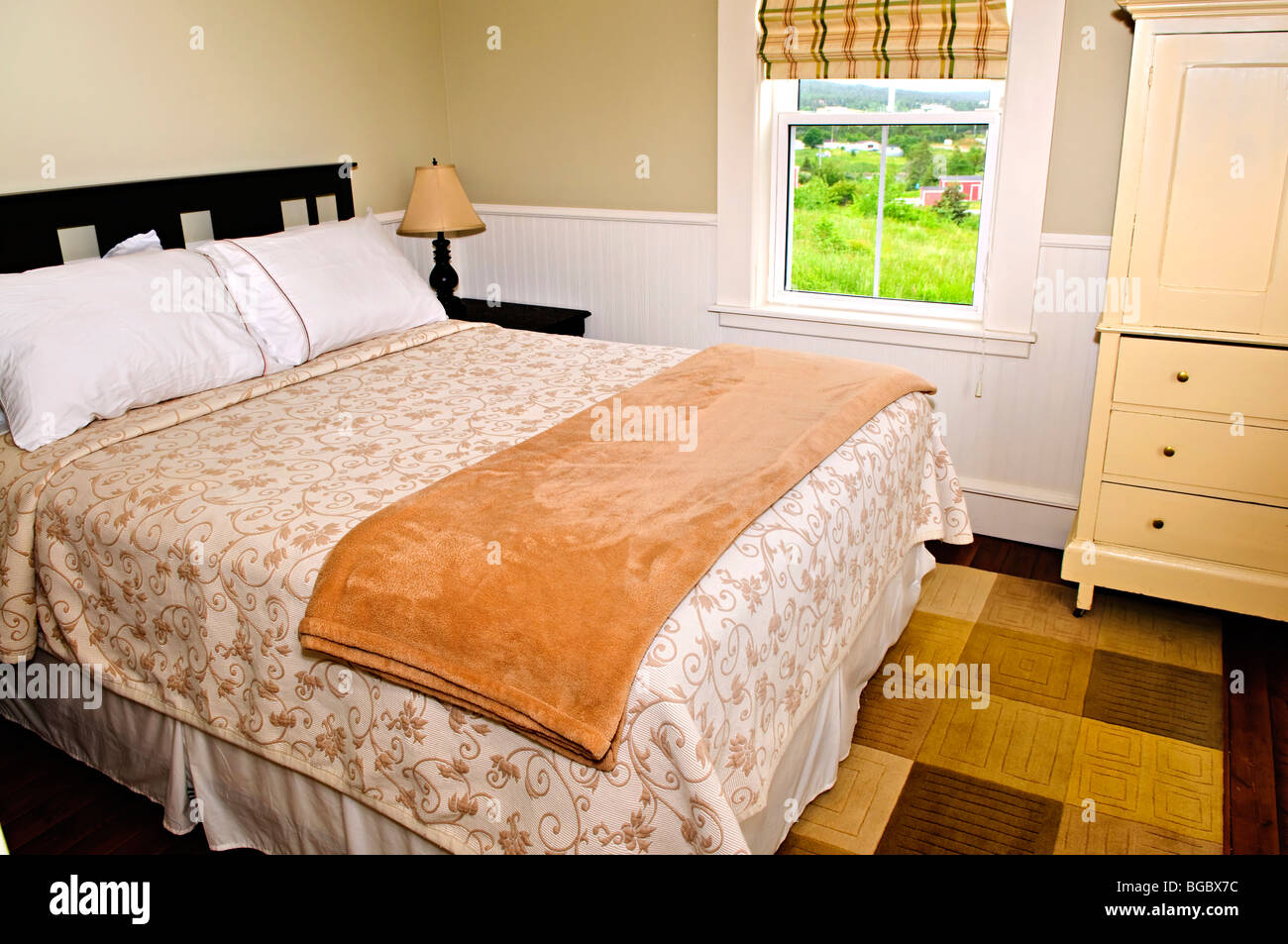 Bedroom interior with comfortable queen size bed with view Stock Photo