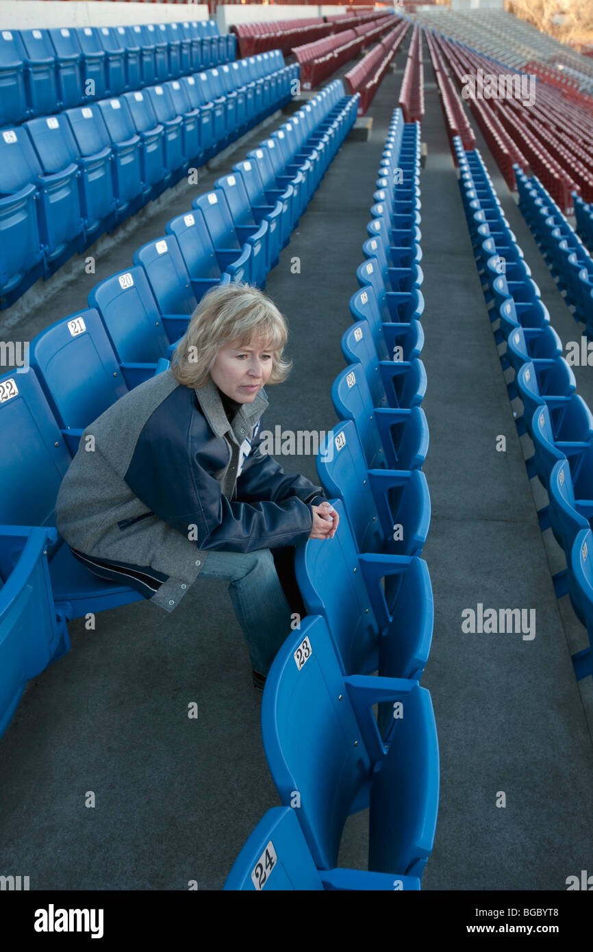 Sitting in the bleachers Stock Photo - Alamy