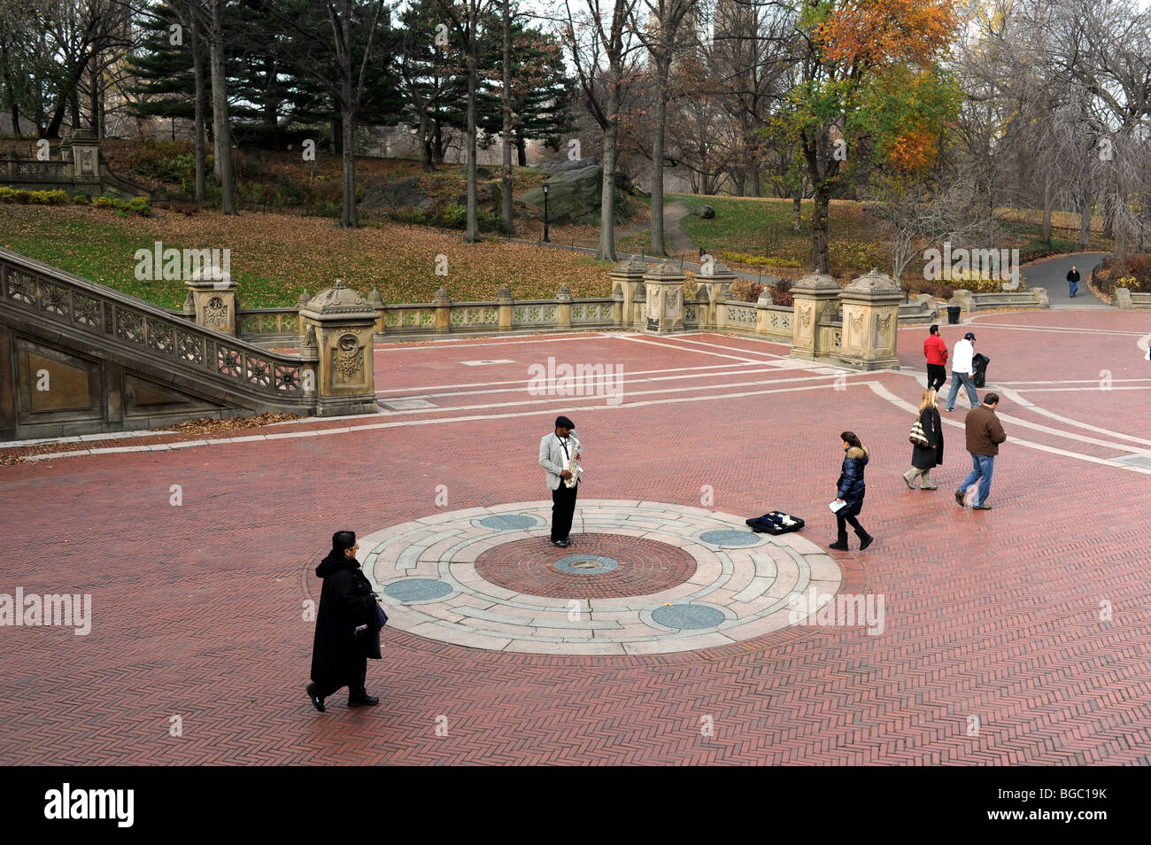 Busker playing saxophone in Central Park Manhattan New York USA - Stock Photo