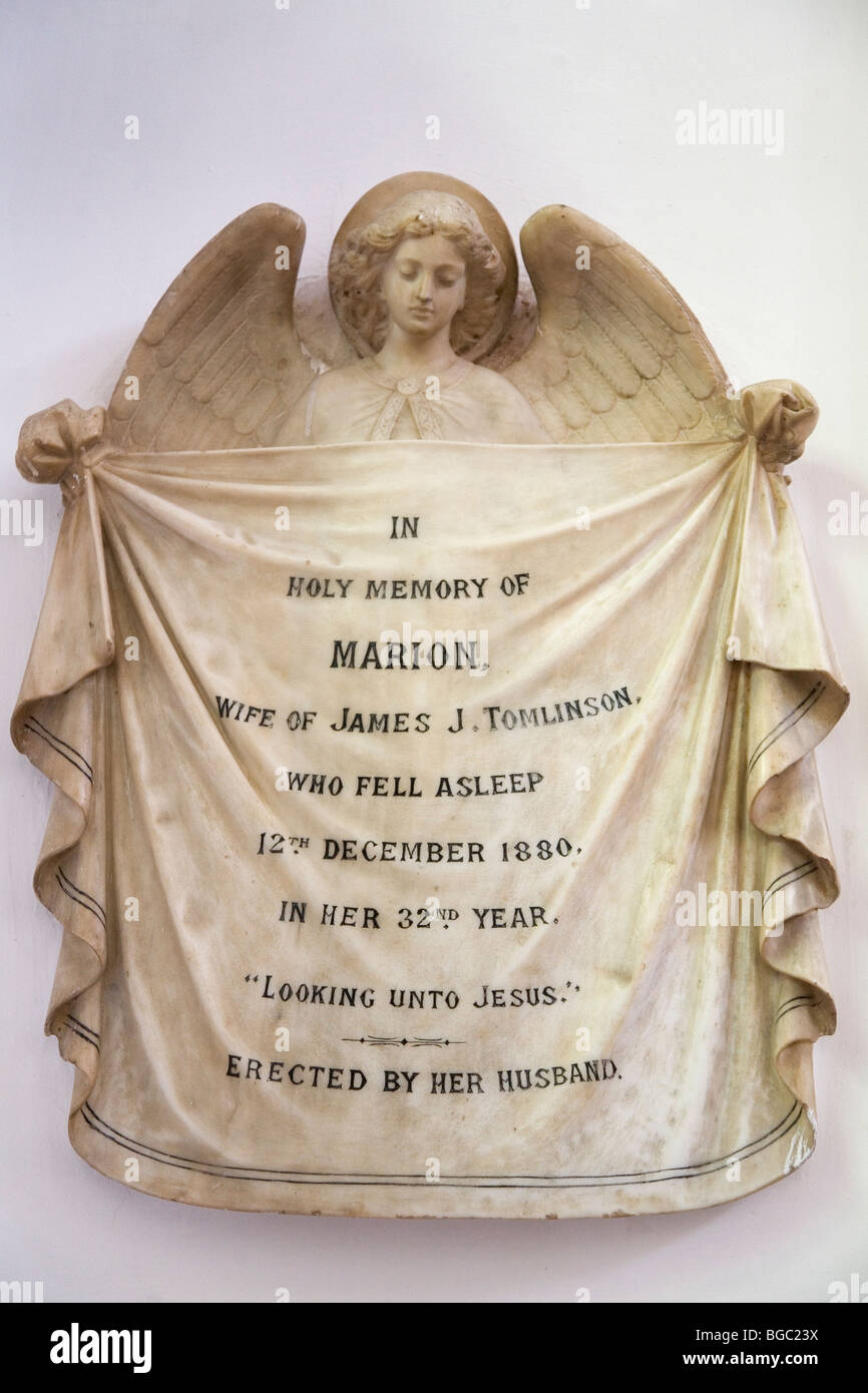 A euphemistic inscription in St Marks Cathedral, Bangalore,  in memory of Marion Tomlinson who 'fell asleep' in 1880. Stock Photo