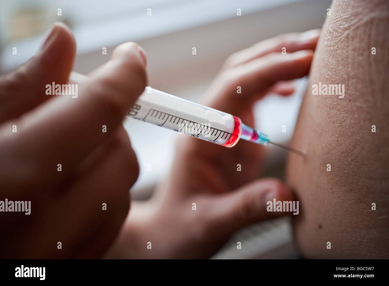 Application of an intramuscular injection Stock Photo
