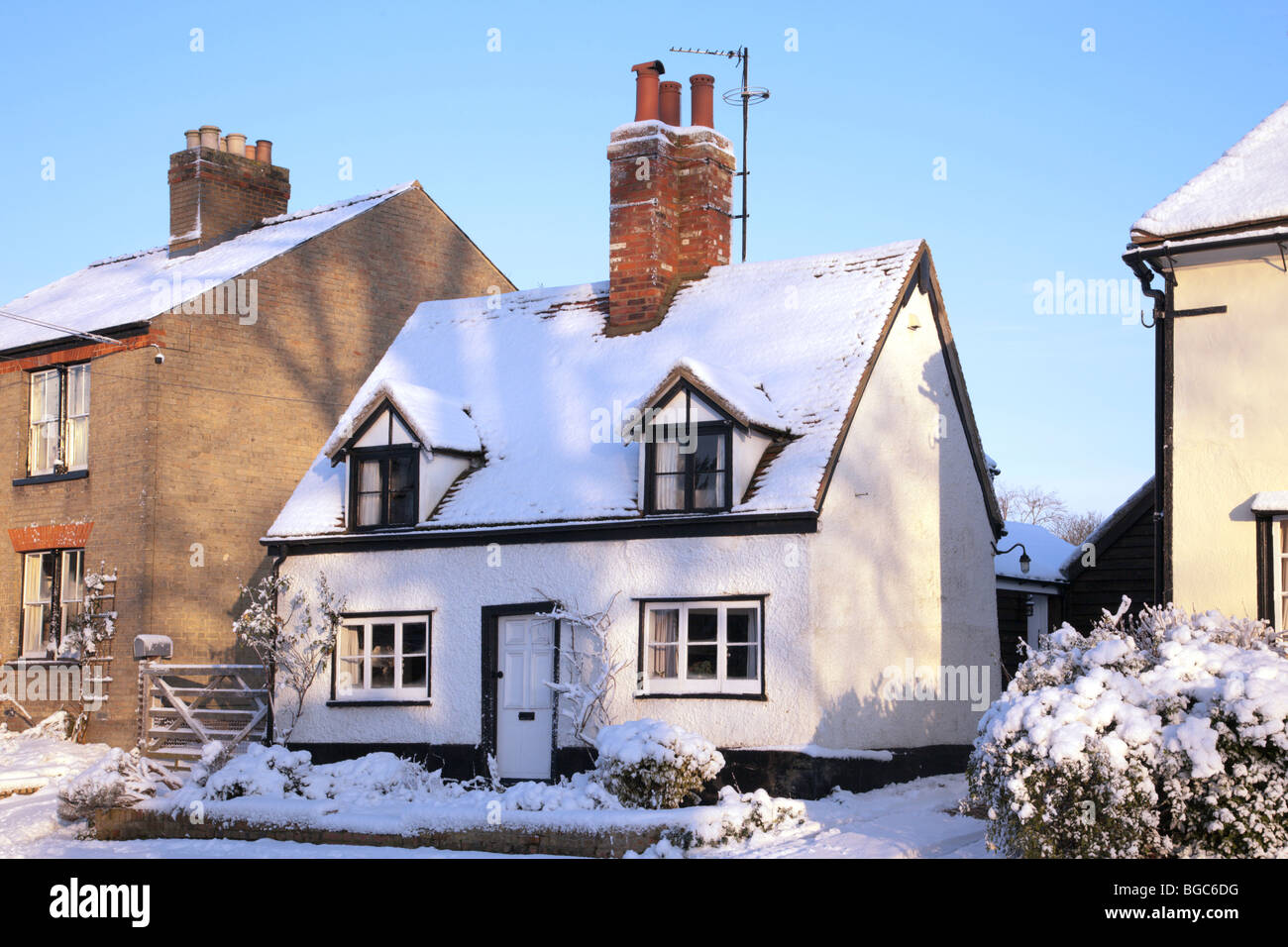 Snow covered cottage Great Gransden Cambridgeshire Stock Photo