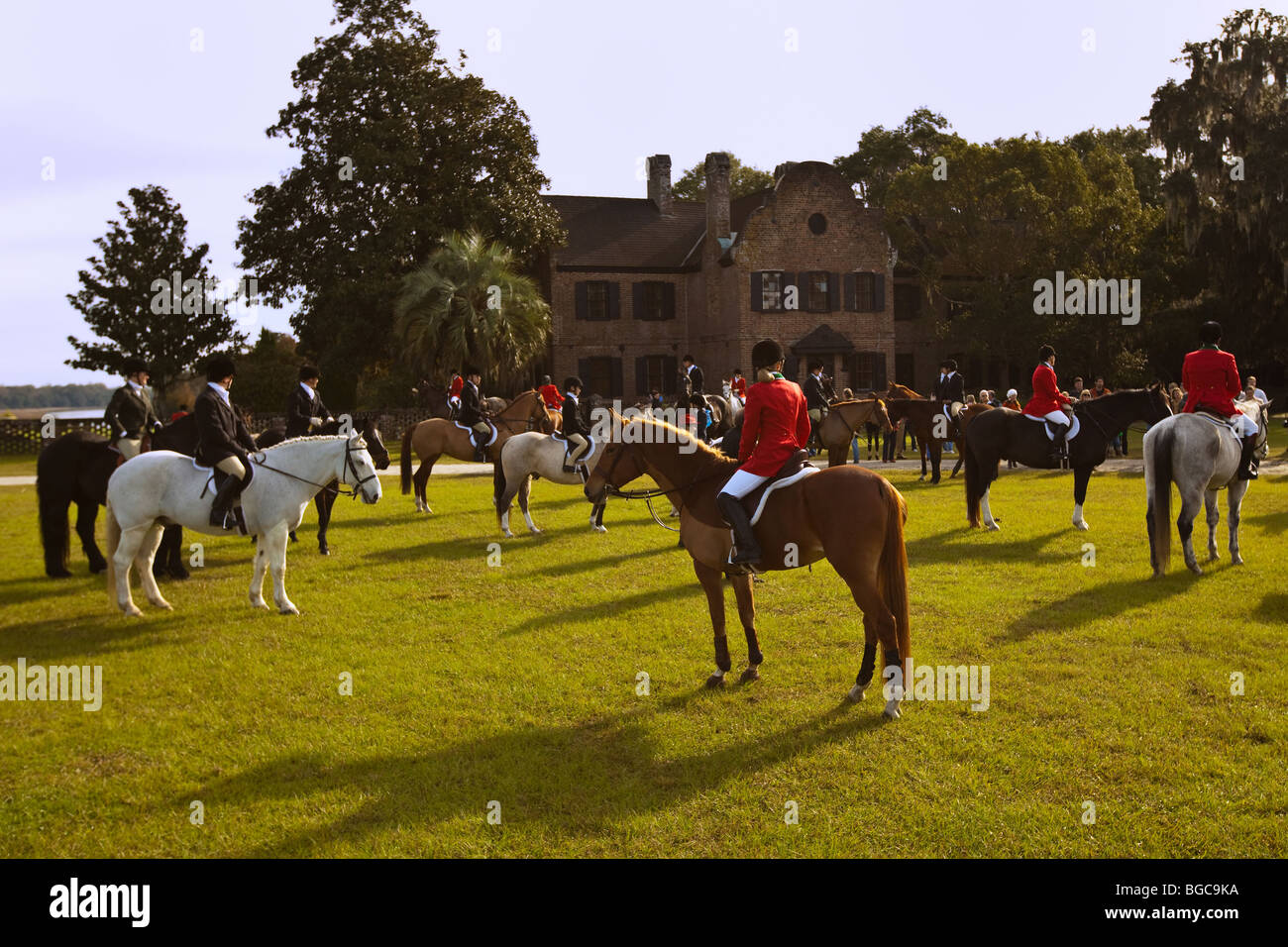 Mounted Fox Hunters on the greensward of the plantation house at Middleton Place plantation in Charleston, SC. Stock Photo