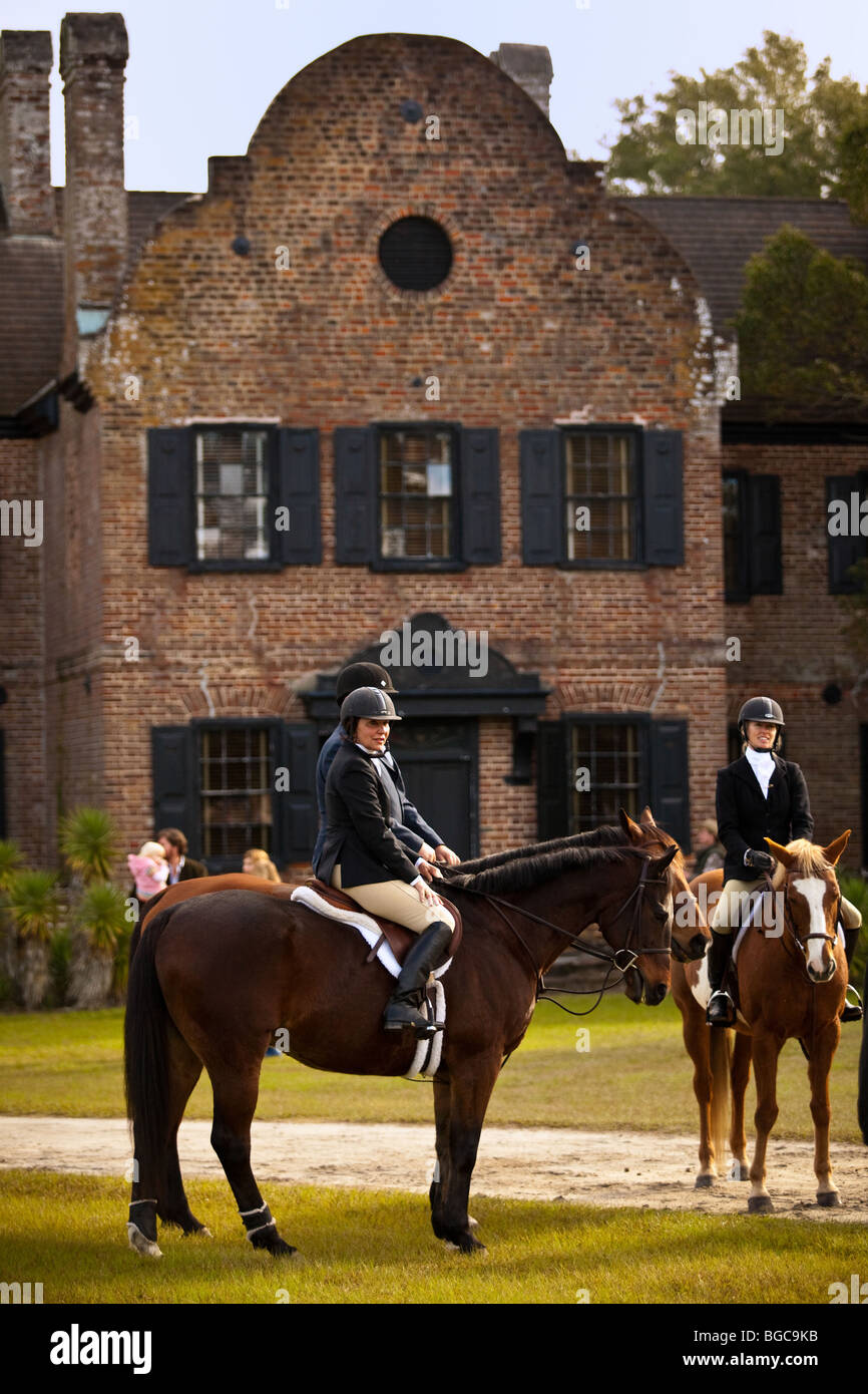 Mounted Fox Hunters on the greensward of the plantation house at Middleton Place plantation in Charleston, SC Stock Photo