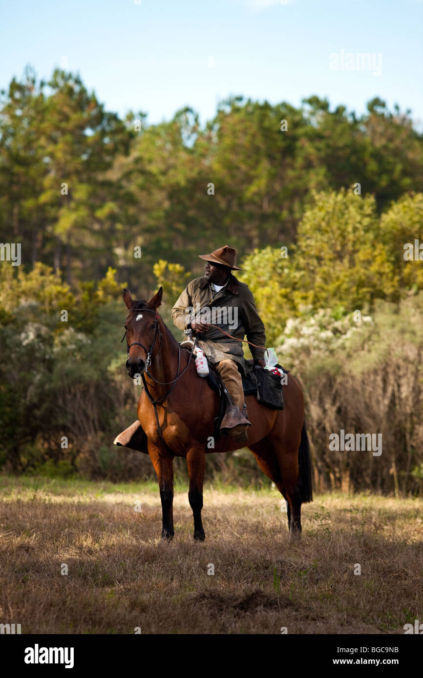 Bill Greene leads the scent during the Middleton Place fox drag hunt in