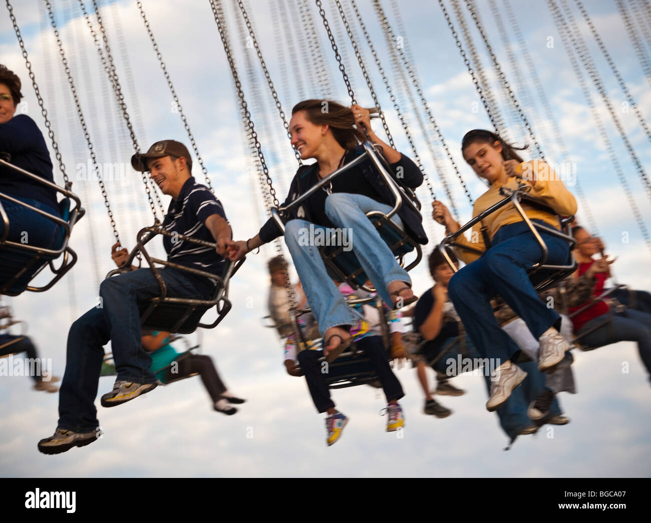 A couple enjoys the swing ride at the South Carolina Coastal Fair in