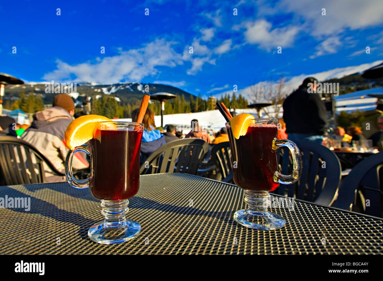 Glasses of hot gluehwein (mulled wine) served at the Longhorn Saloon and  Grill an apres-ski bar at the base of Whistler Mountain Stock Photo - Alamy