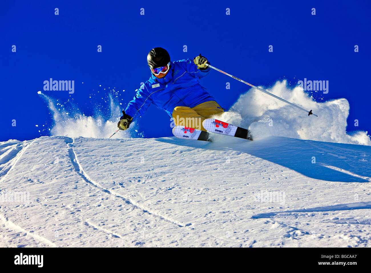 Skier on the upper slopes of Whistler Mountain, Whistler Blackcomb, Whistler, British Columbia, Canada. Stock Photo
