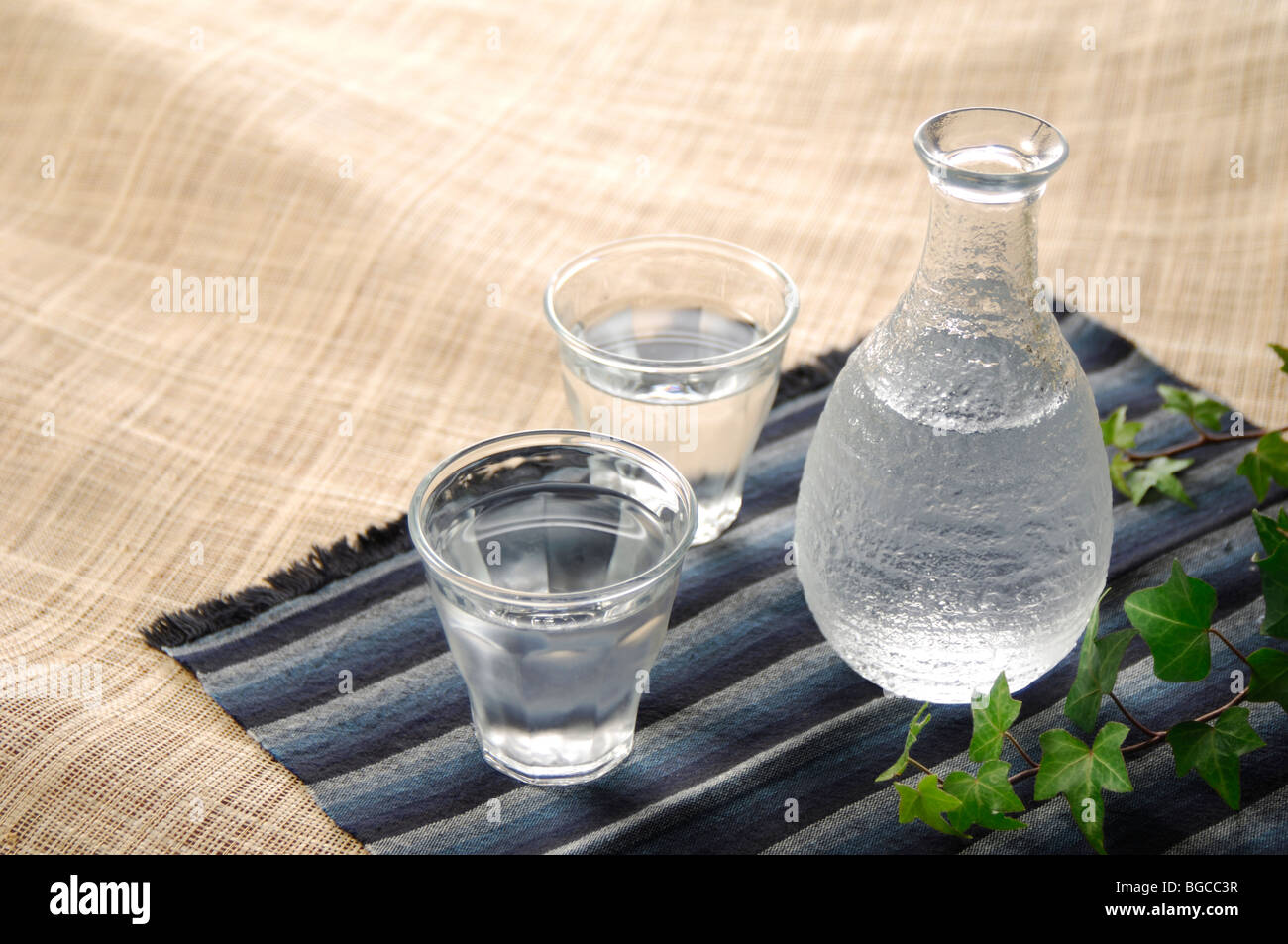 Sake bottle and glass Stock Photo Alamy