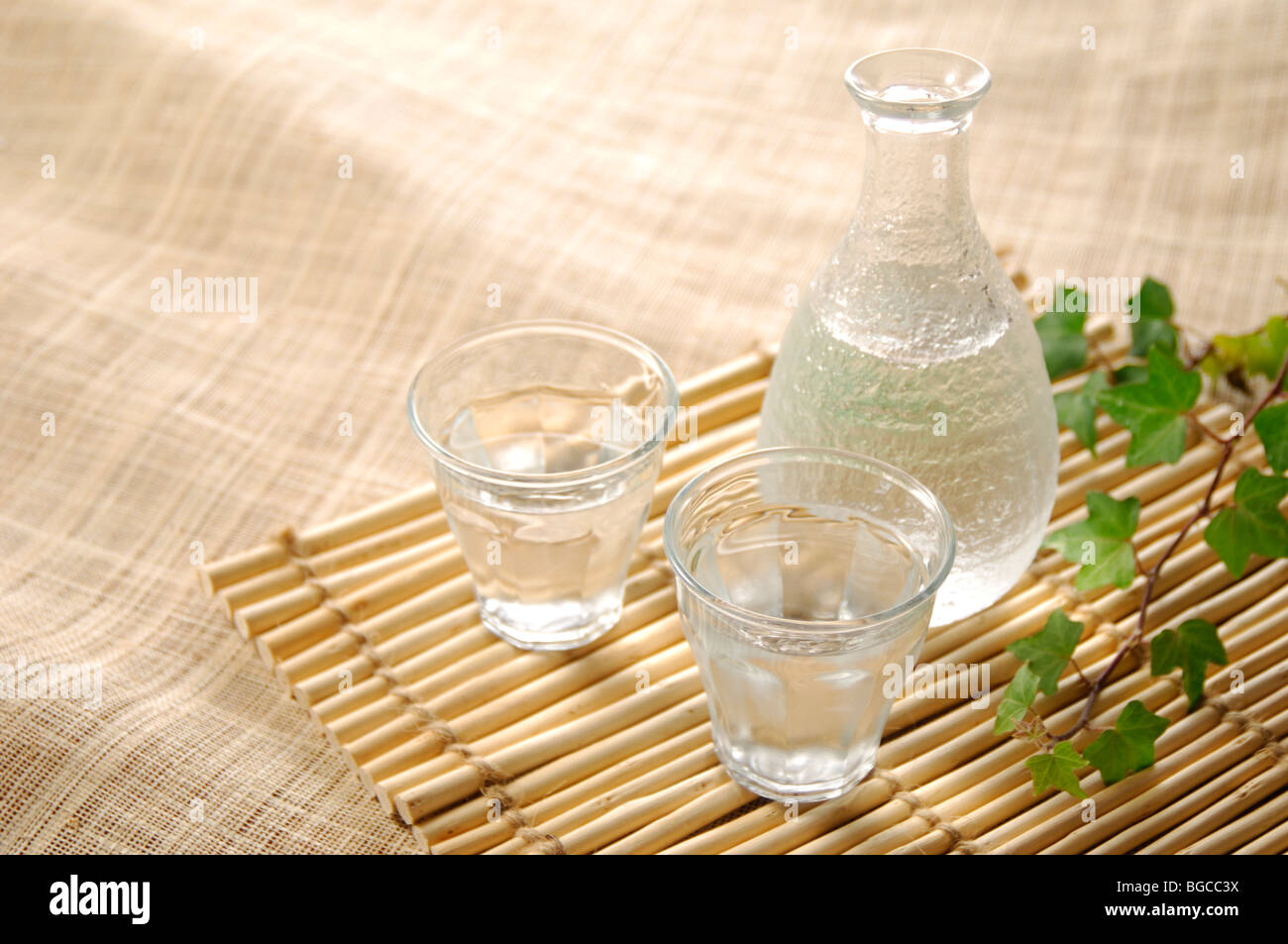Sake bottle and glass Stock Photo Alamy