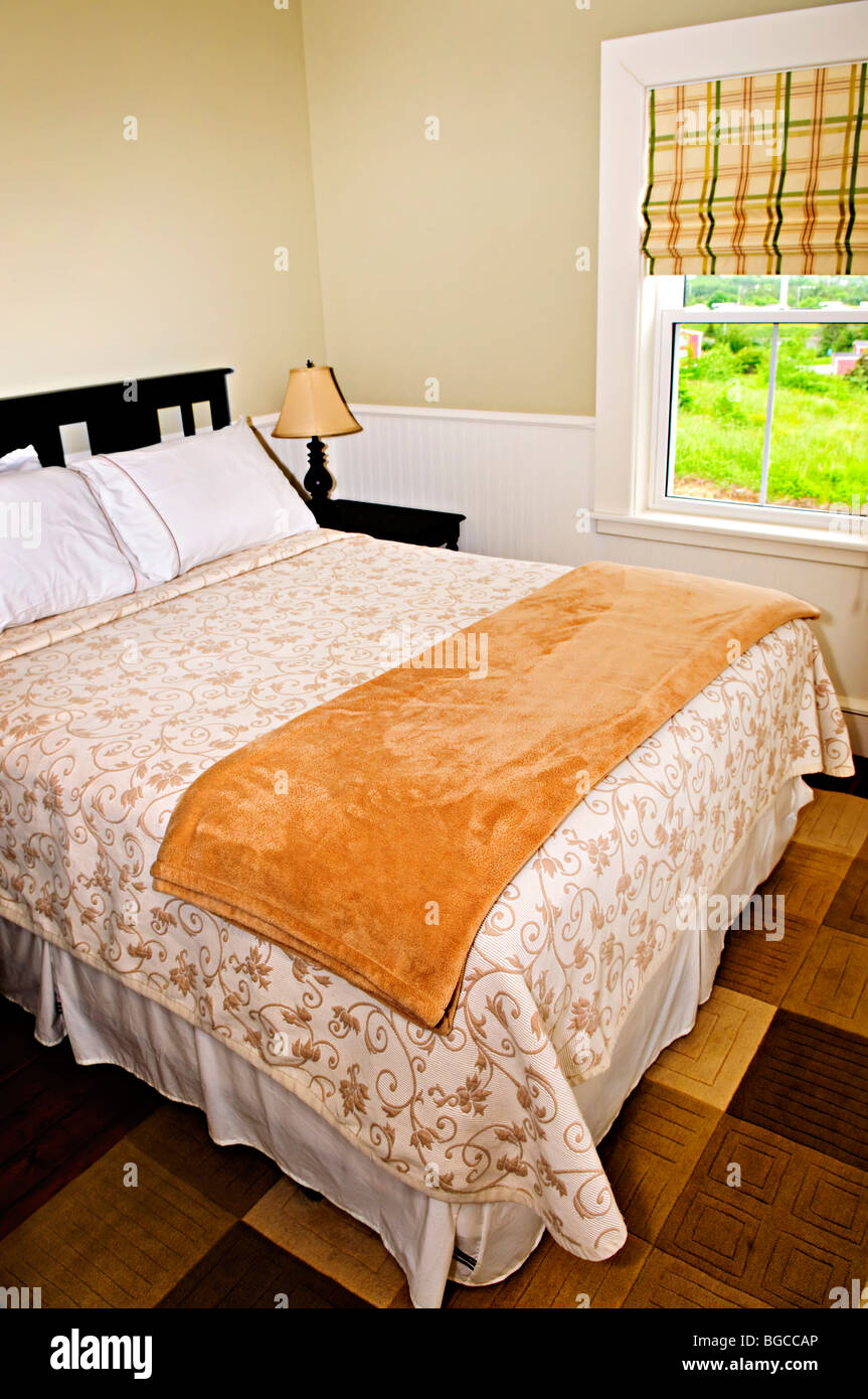 Bedroom interior with comfortable queen size bed with view Stock Photo