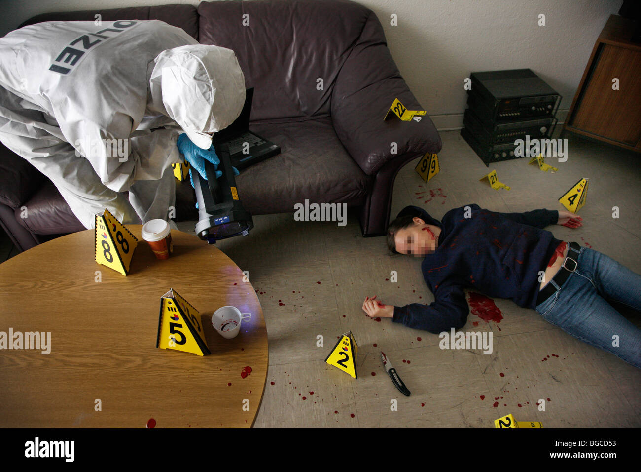 Crime scene investigation, forensic people at a murder scene. Police work, preservation of evidences. Stock Photo