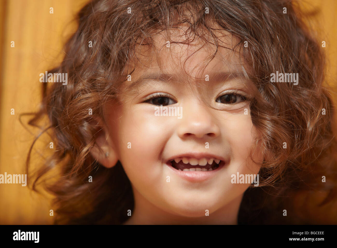Portrait of young girl smiling Stock Photo - Alamy