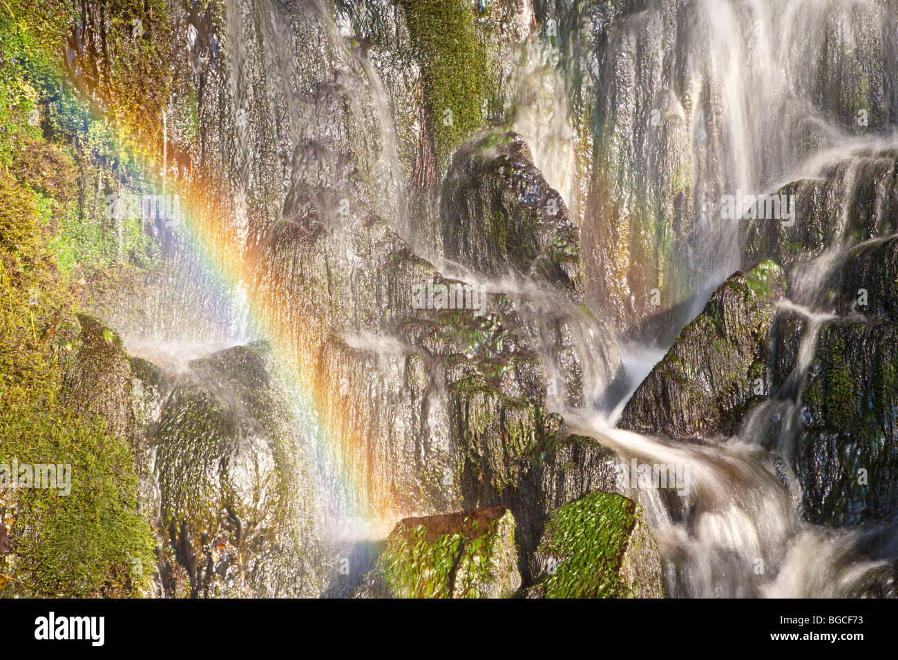 Rainbow in Waterfall, Ingleton Yorkshire. Stock Photo