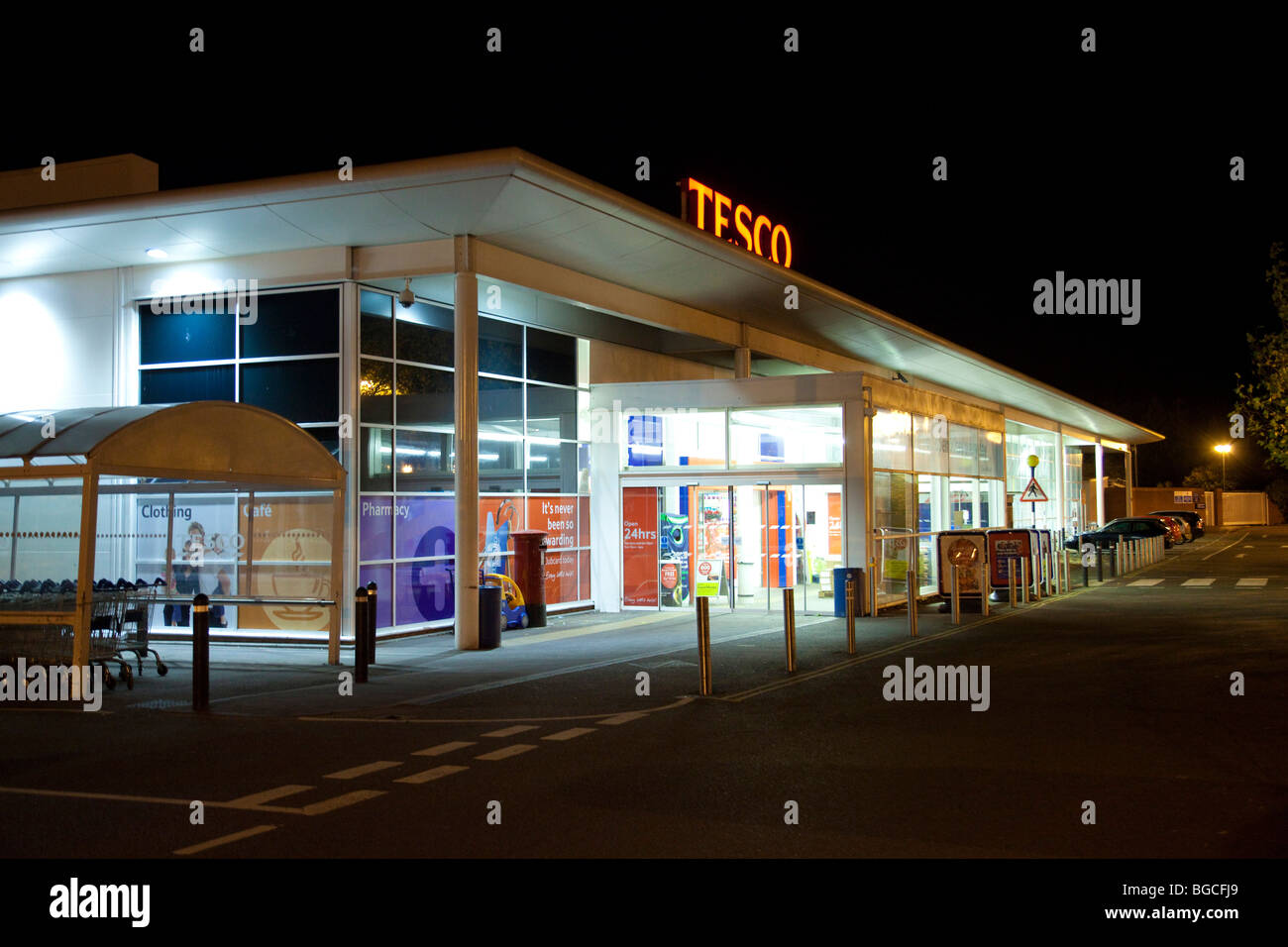 Tesco store at night Stock Photo