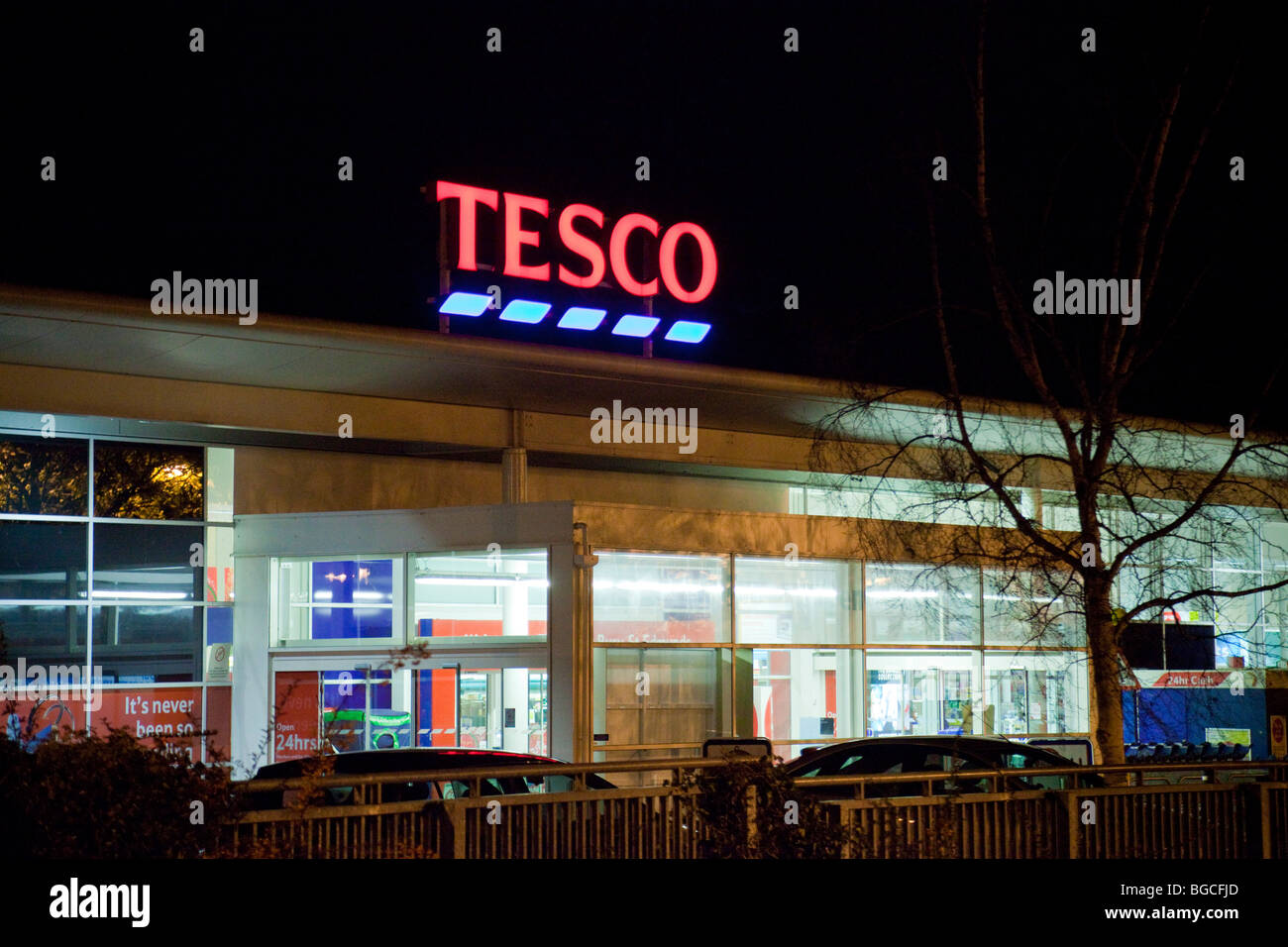 Tesco store at night Stock Photo