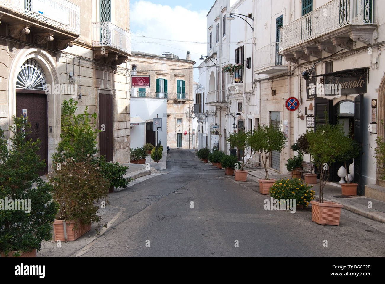 A narrow street in the old town, Ostuni, Italy Stock Photo