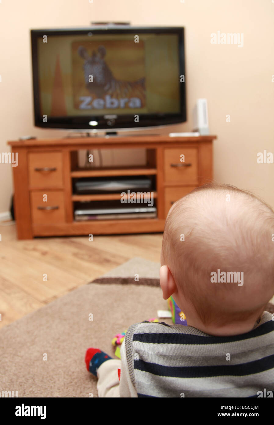 Baby Watching Tv Stock Photo Alamy