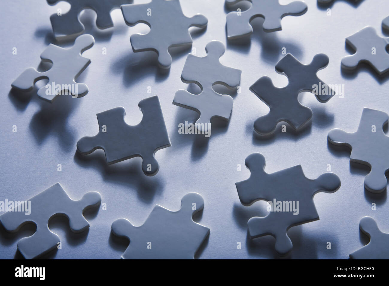 Backlit jigsaw puzzle pieces as a nice background Stock Photo