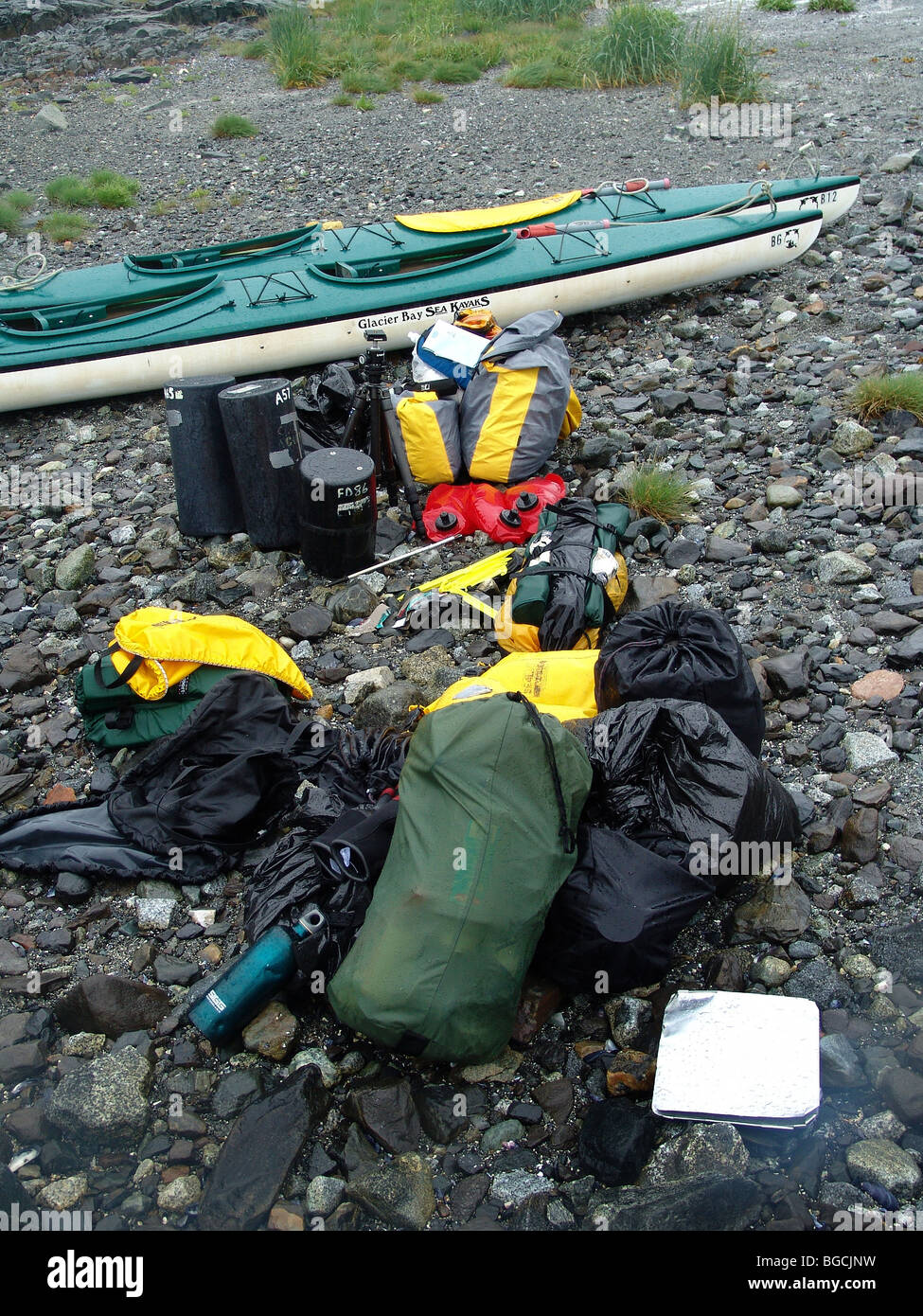 bear can,equipment is waterproof and safe for bears. Kayak tour in the Glacier Bay National Park, Alaska, USA. Stock Photo