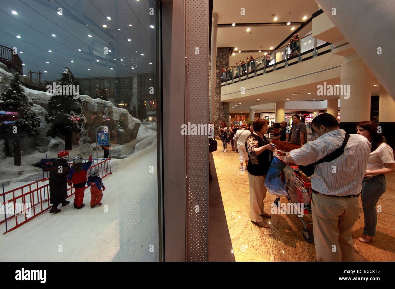 People in the indoor ski hall in the Mall of Dubai, United Arab Emirates Stock Photo