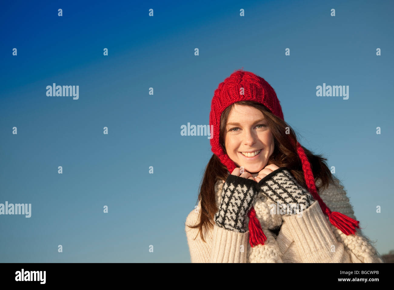 woman wearing a red woolen hat and scarf Stock Photo