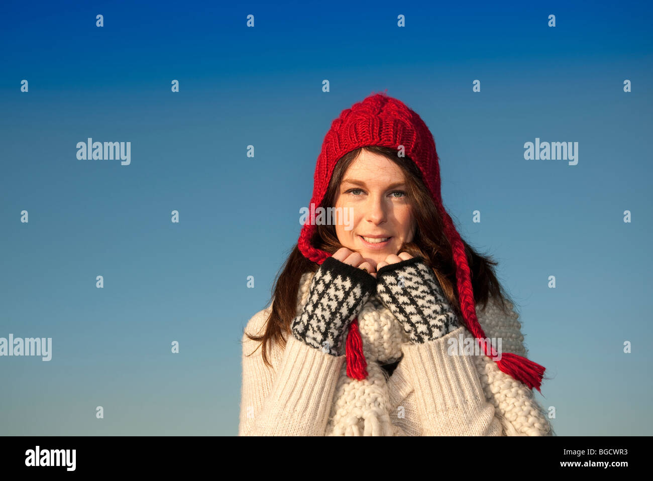 woman wearing a red woolen hat and scarf Stock Photo