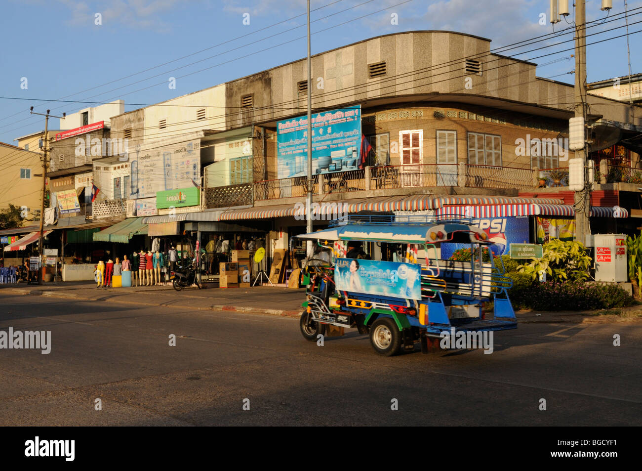 Laos; Savannakhet; Street Scene with Tuk-Tuk Stock Photo