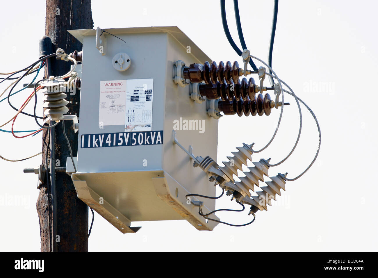 AC high-voltage power transformer on a farm in South Africa Stock Photo