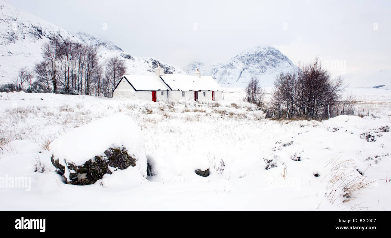 Blackrock Cottage, Glencoe, Scotland in winter. Winter (Dec) 2009. Stock Photo