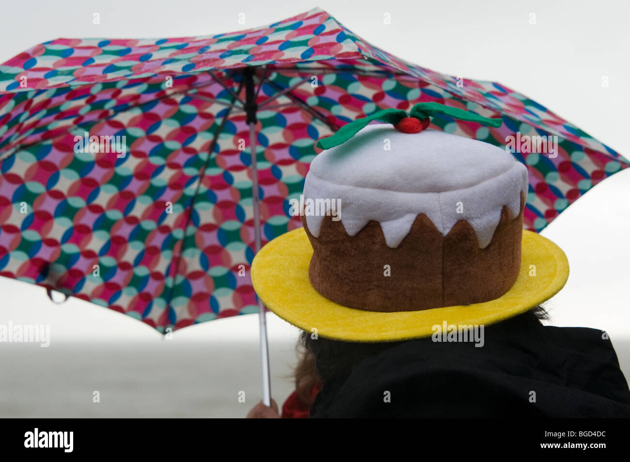 Wearing umbrella hat High Resolution 