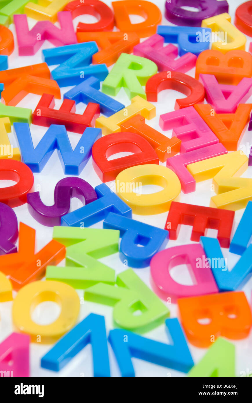 Brightly Colored Childrens Toy Magnetic Alphabet Letters on White