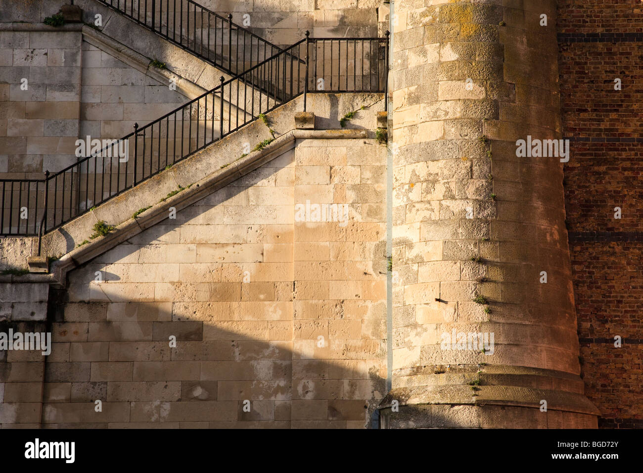 Stone stairs leading a zig-aag path from Ramsgate Royal Harbour to the West Cliff in the evening sunlight, Ramsgate, Kent, UK Stock Photo