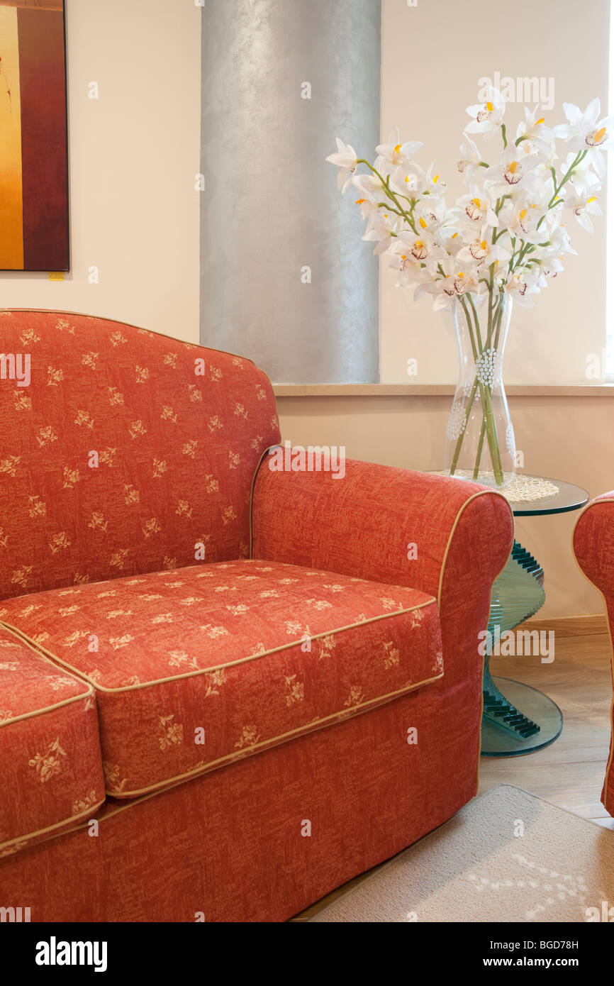 Classic velvet sofa in orange color detail Stock Photo Alamy