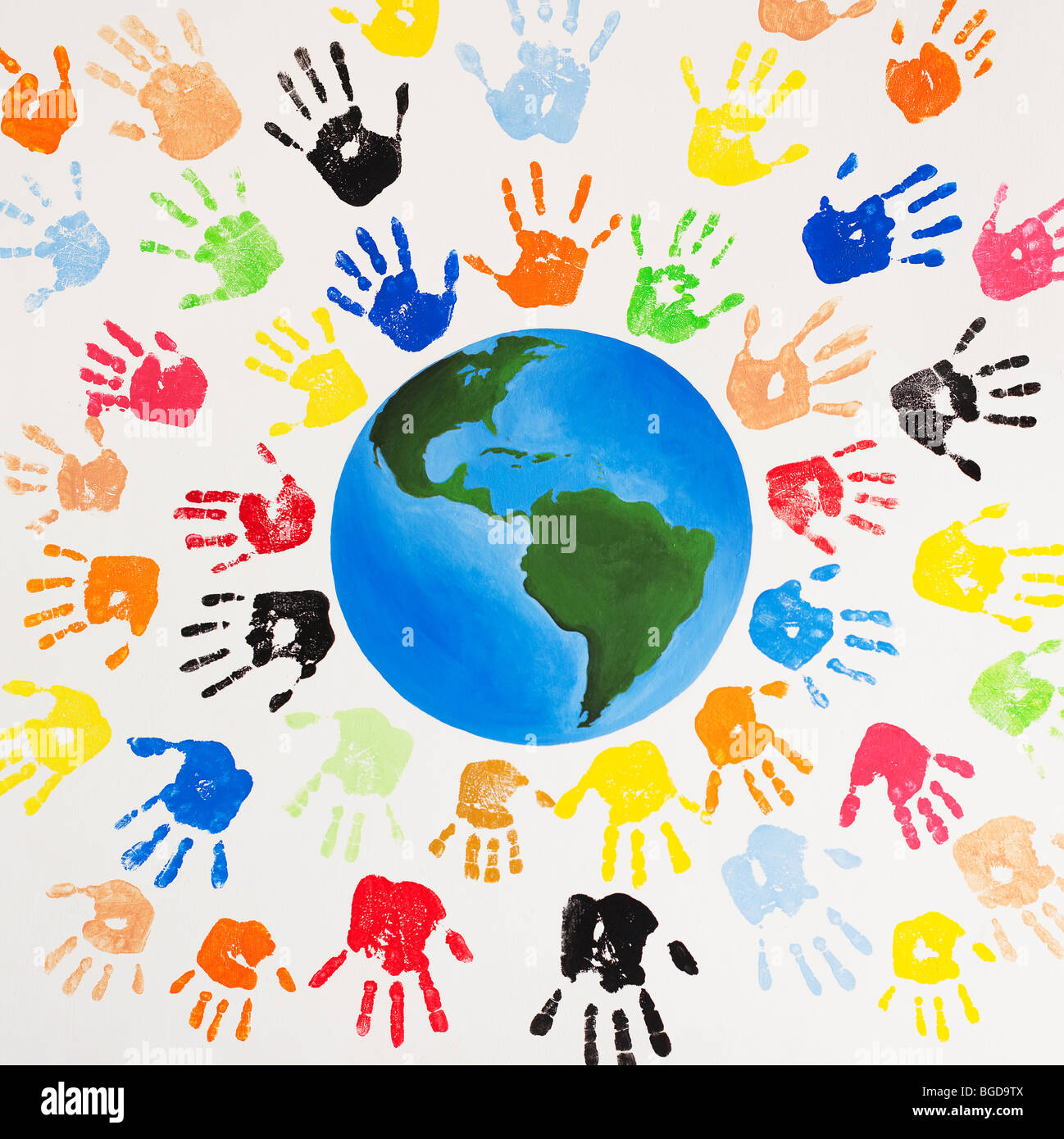 Multicoloured painted children's hand prints around the world Stock Photo