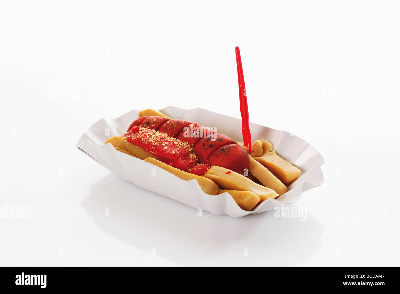 Curry sausage with fries made from marzipan Stock Photo