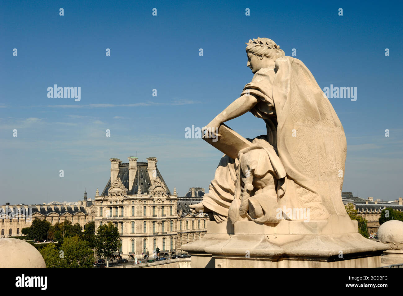 Louvre Museum & Beaux-Arts or Classical Sculpture or Statue with Book on the Roof Terrace of the Musée d'Orsay or Orsay Museum, Paris, France Stock Photo