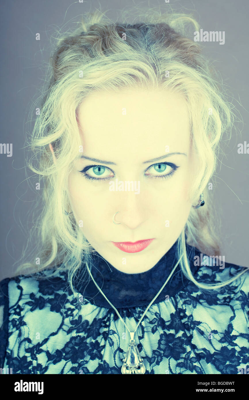 Young woman, blond, Gothic style with a serious expression on her face Stock Photo