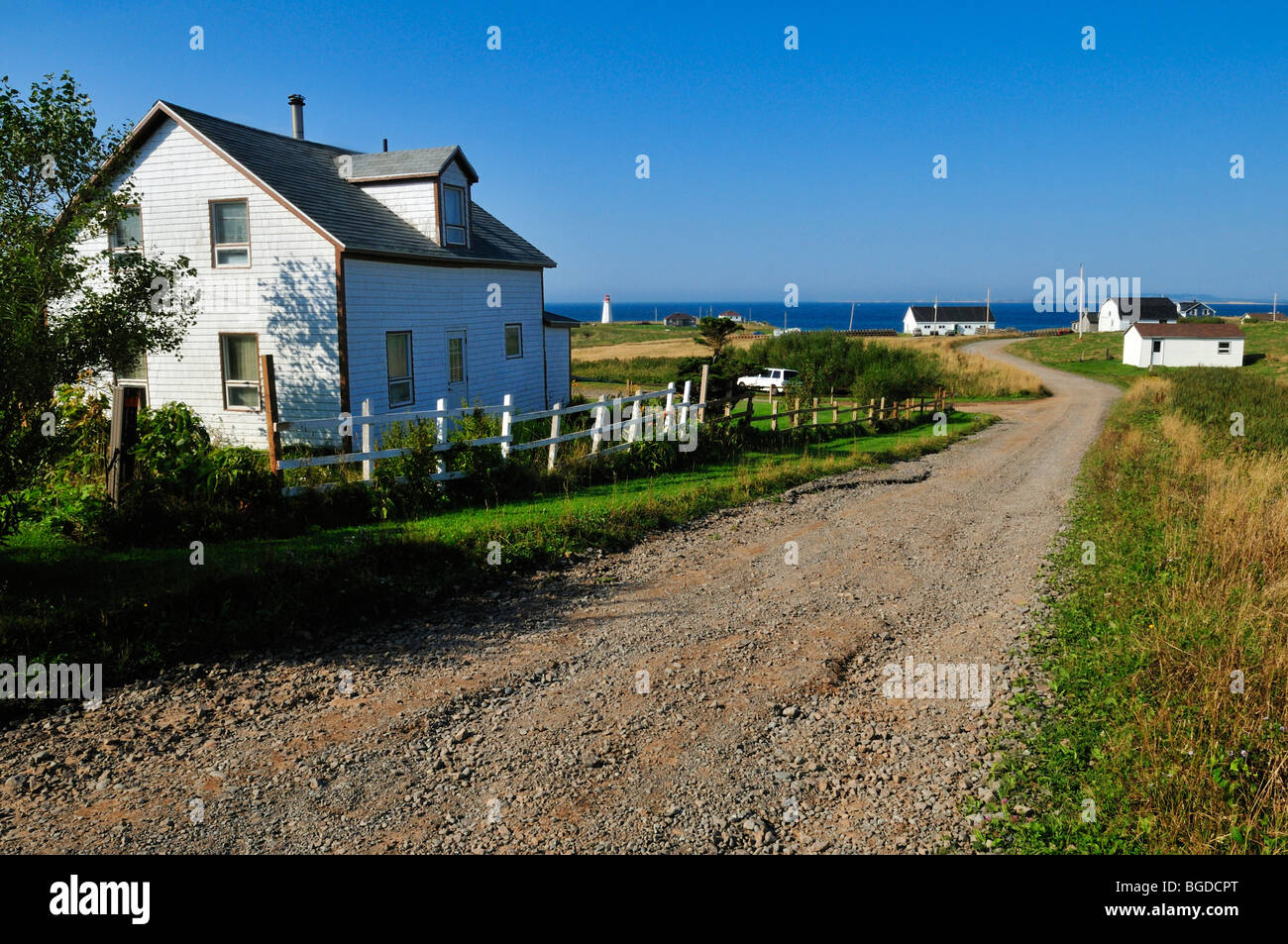 Houses along the main road of Ile d'Entree, Entry Island, Iles de la Madeleine, Magdalen Islands, Quebec Maritime, Canada, Nort Stock Photo