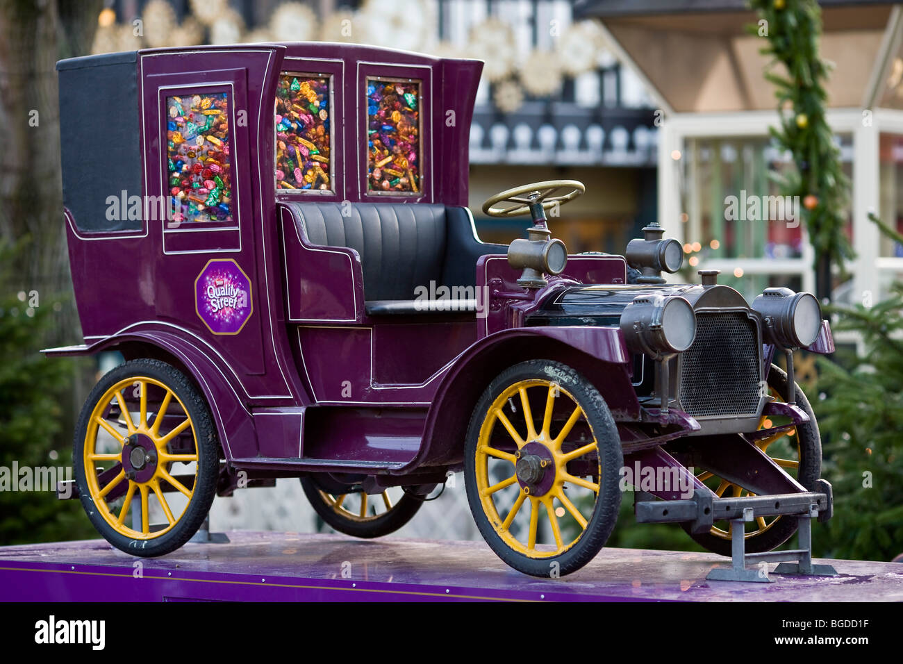 Vintage car filled with Quality Street sweets Stock Photo