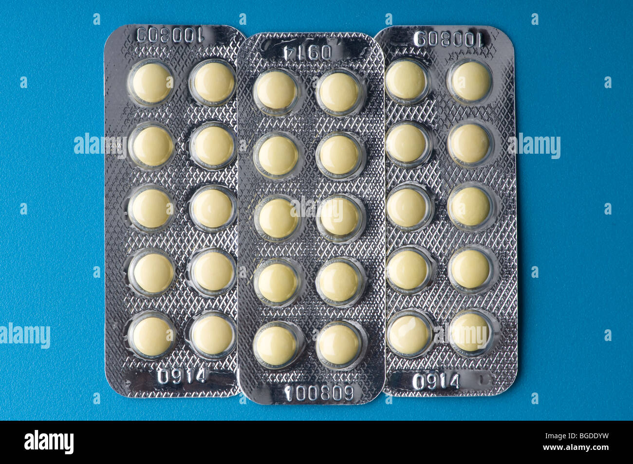 object on blue - Medical tablet close up Stock Photo - Alamy