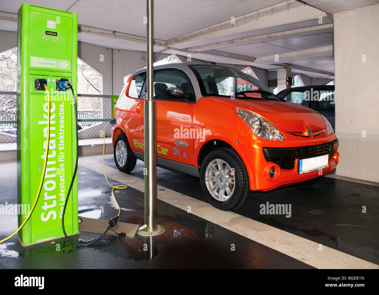 electric vehicle charging at charging station for electrical cars of a