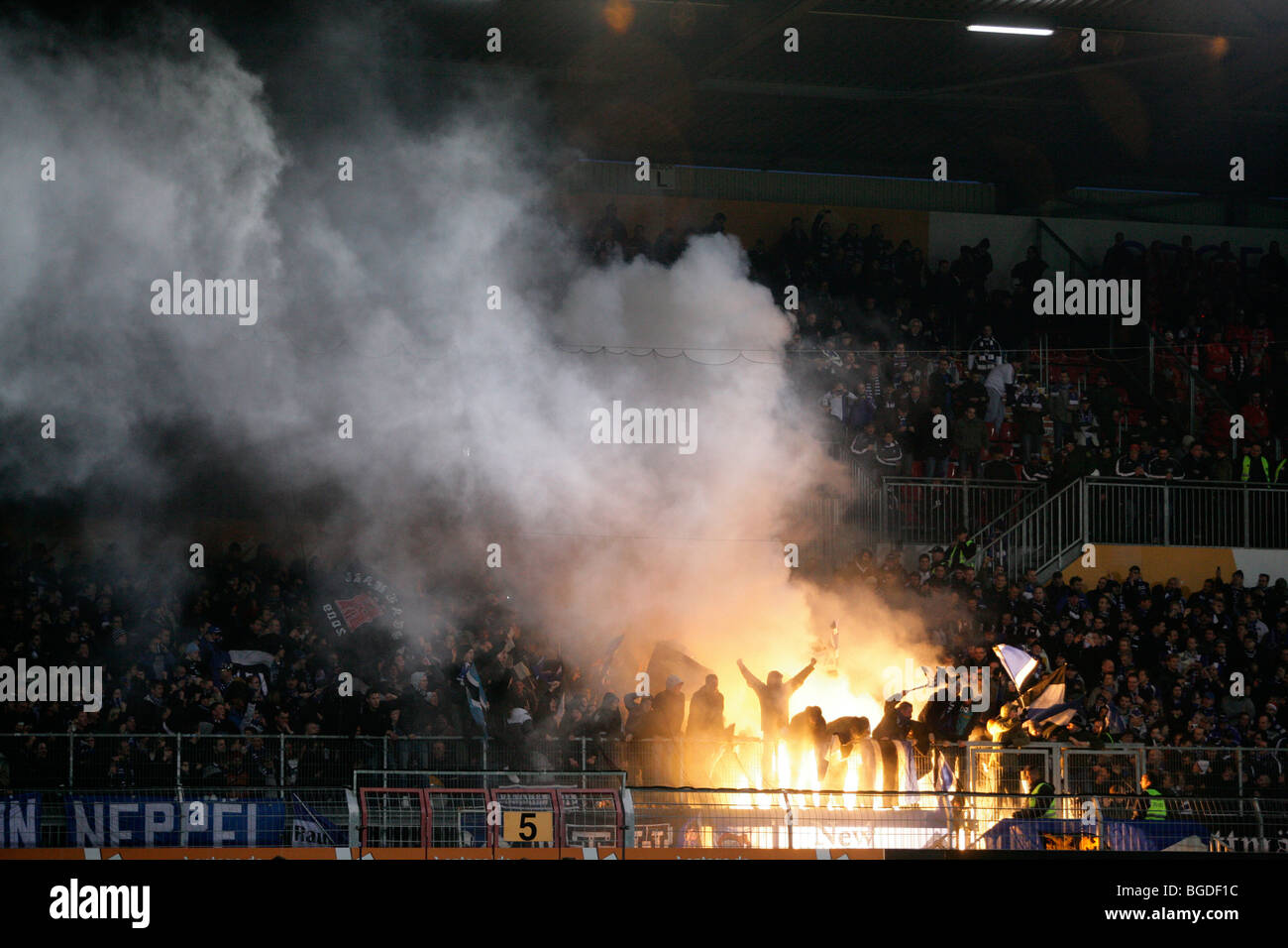Hamburg fans have ignited fireworks, soccer Bundesliga, FSV Mainz 05 vs. Hamburger SV in Bruchwegstadion stadium in Mainz, Rhin Stock Photo