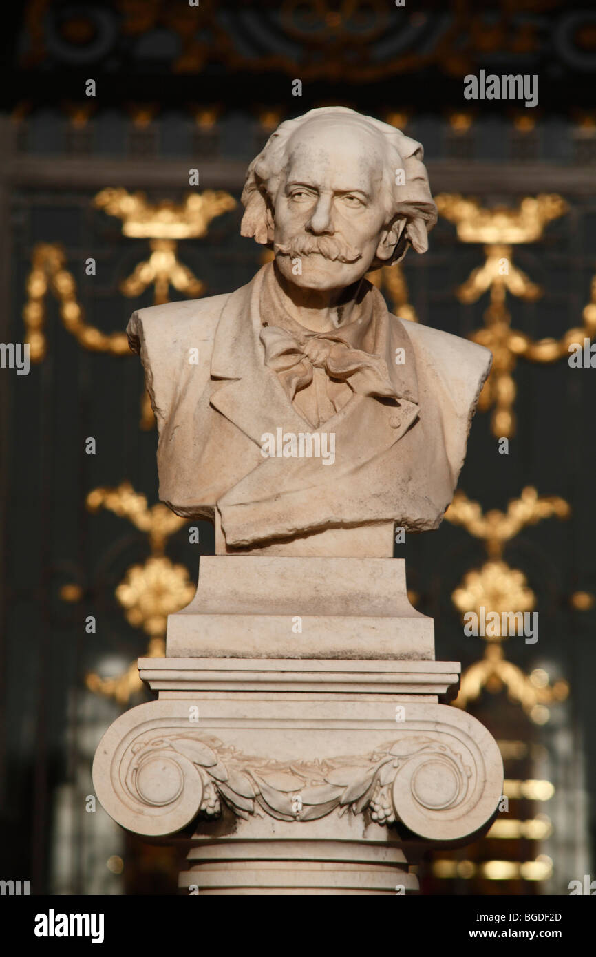 Bust of the composer Jules Massenet, 1842-1912, in the west facade of the Monte Carlo Opera, in front of gold ornamentation of  Stock Photo