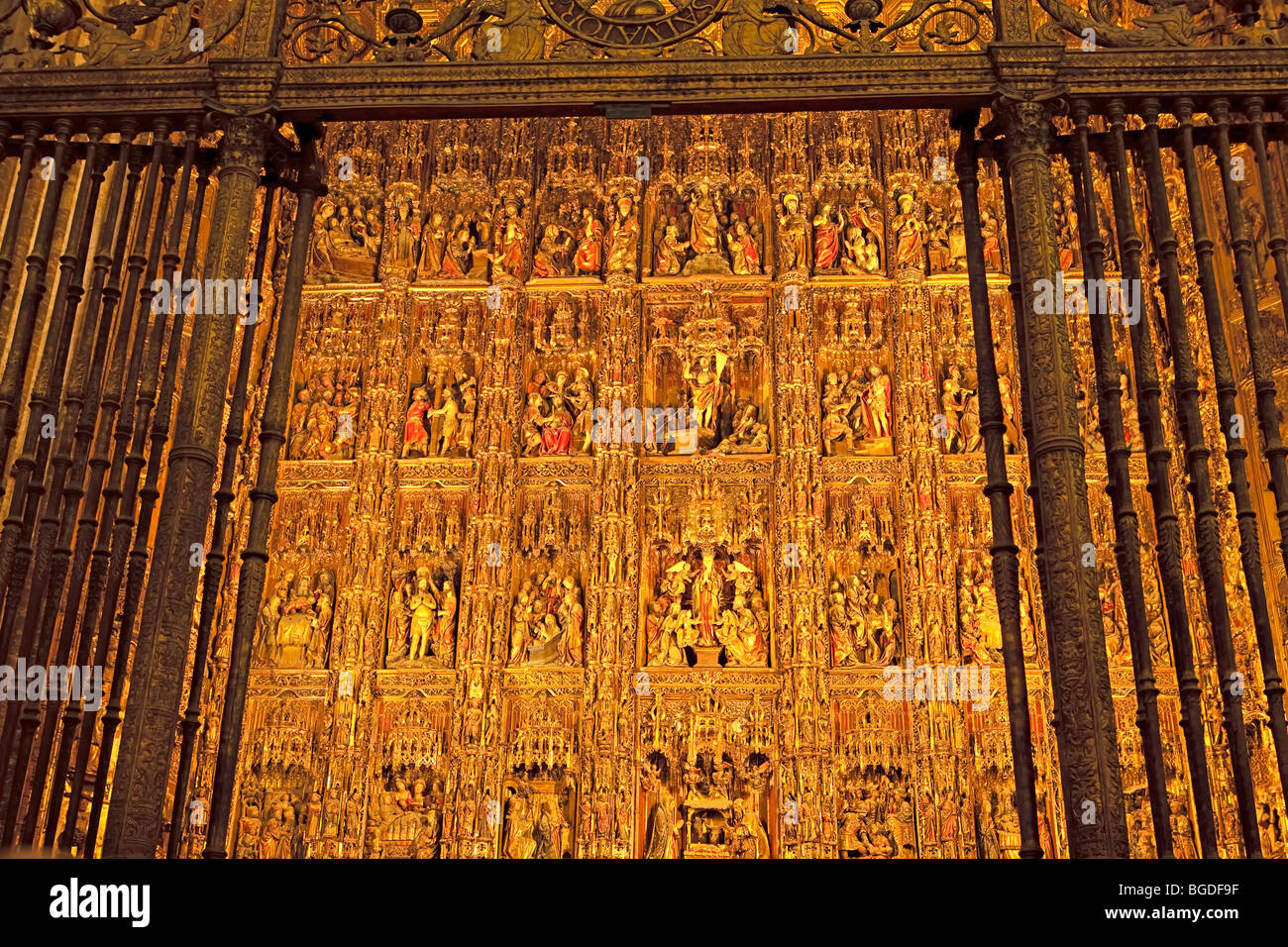 Details of the High Alter in the Seville Cathedral and La Giralda (bell tower/minaret), a UNESCO World Heritage Site, Santa Cruz Stock Photo